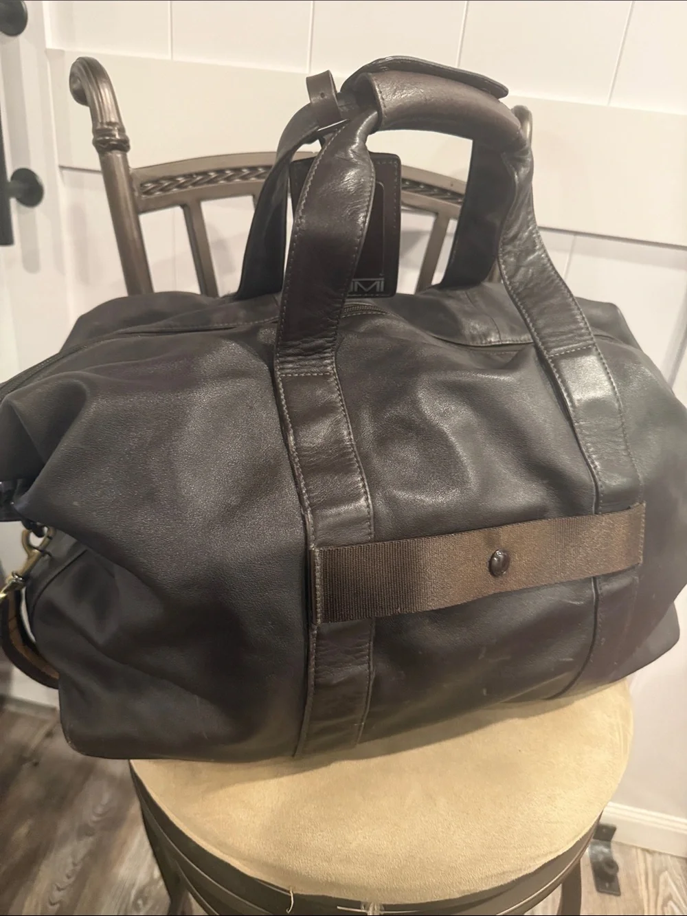 Tumi Dark Brown Leather Duffel with Striped Shoulder Strap